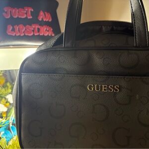 Guess Black Embossed Makeup bag for work and travel bag for women or men used
